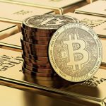 Picture of bitcoins sitting on top of a stack of gold bricks
